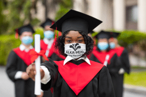 face-mask-mockup-featuring-a-woman-with-a-graduation-diploma-m25950-r-el2